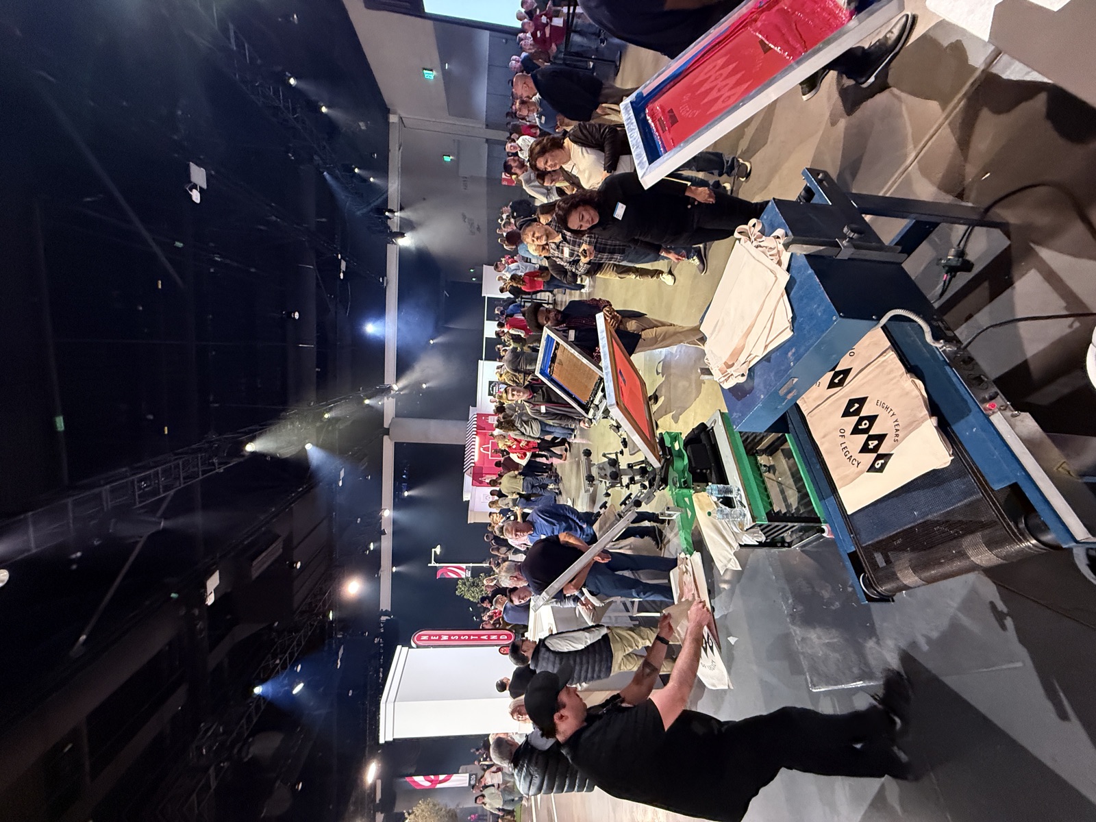 Guests lined up at a live Merch Troop activation for On-Demand T-Shirt Printing